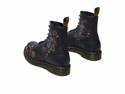 Black boots with floral embroidery